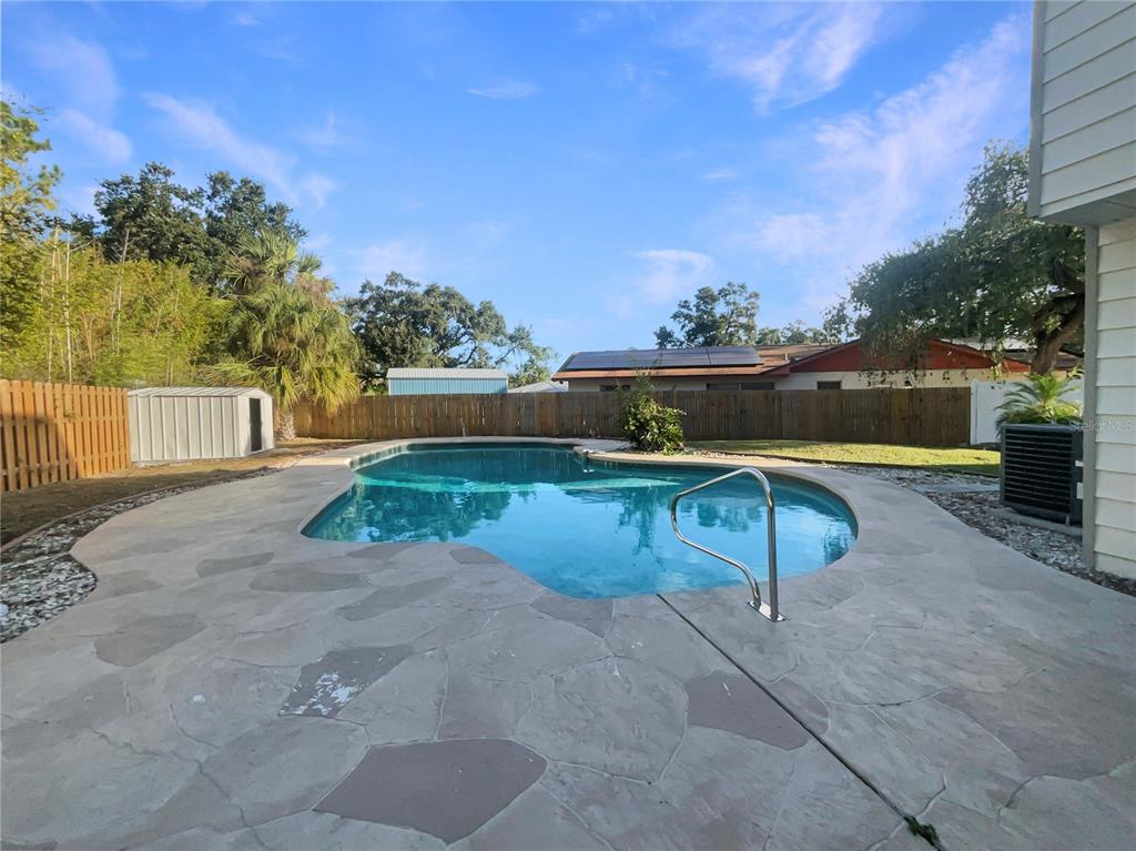 1911 Rambling Lane Brandon, FL 33510 - Photo 25 of 29 a view of a lake with a outdoor space