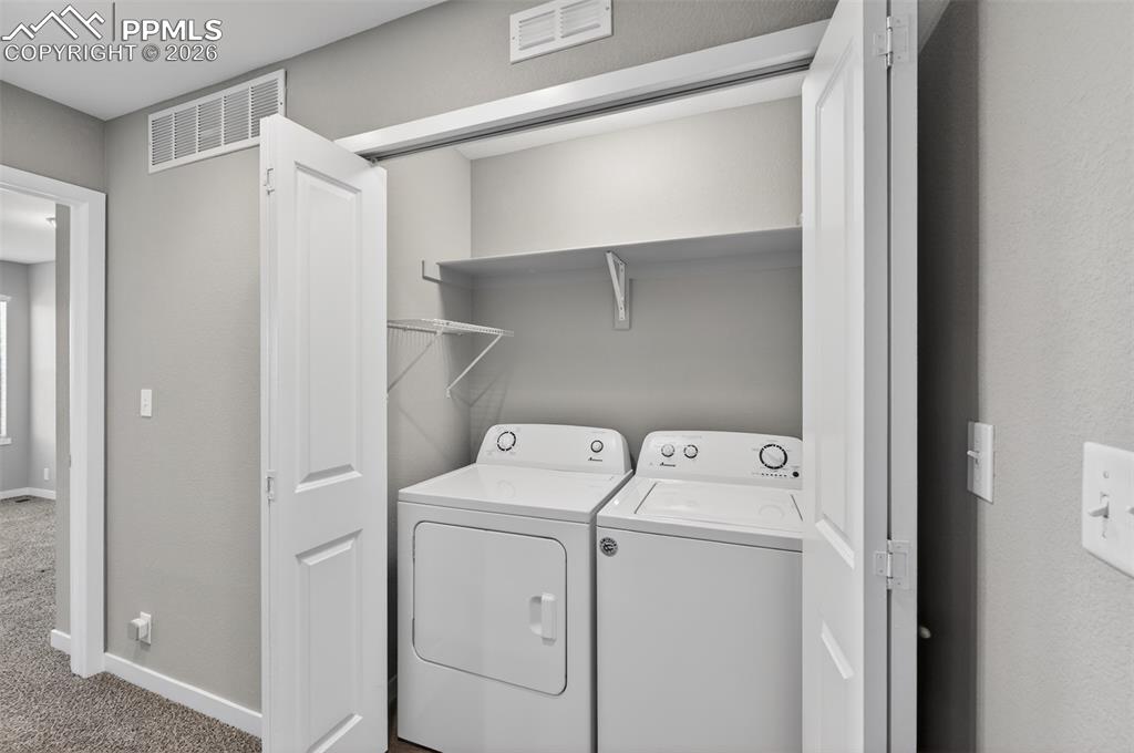 216 Ash Street Bennett, CO 80102 - Photo 30 of 46 Upstairs laundry