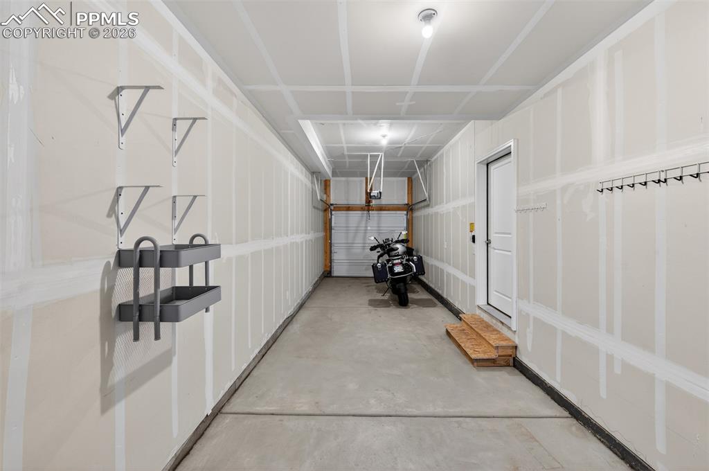 216 Ash Street Bennett, CO 80102 - Photo 34 of 46 Tandem Garage