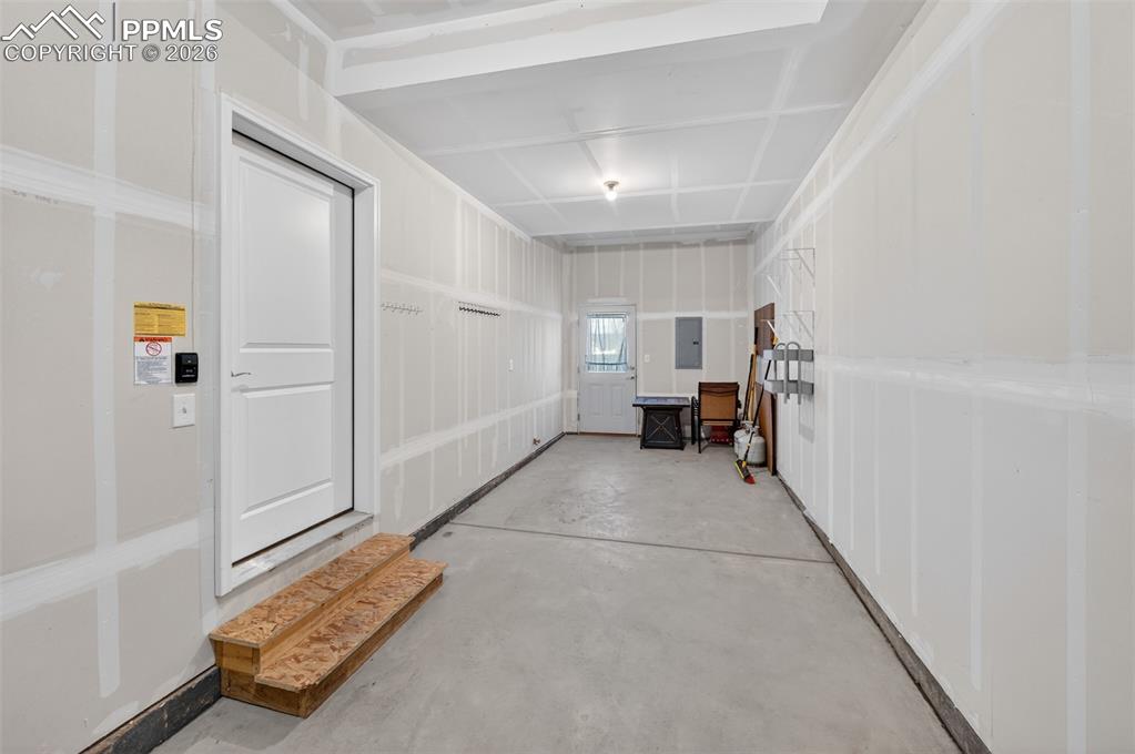 216 Ash Street Bennett, CO 80102 - Photo 35 of 46 Tandem Garage