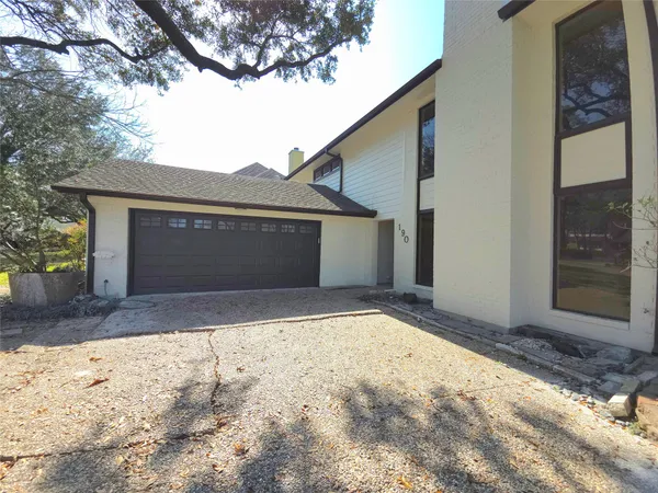 a view of backyard of house