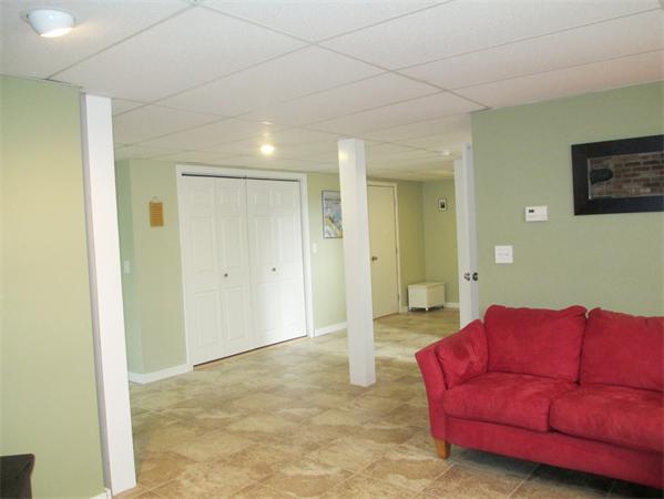 22 Rickey Drive Maynard, MA 01754 - Photo 15 of 16 a living room with furniture