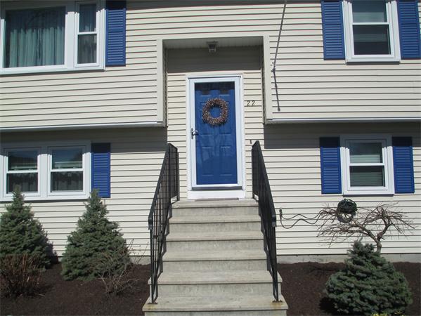 22 Rickey Drive Maynard, MA 01754 - Photo 2 of 16 a view of a house with potted plants