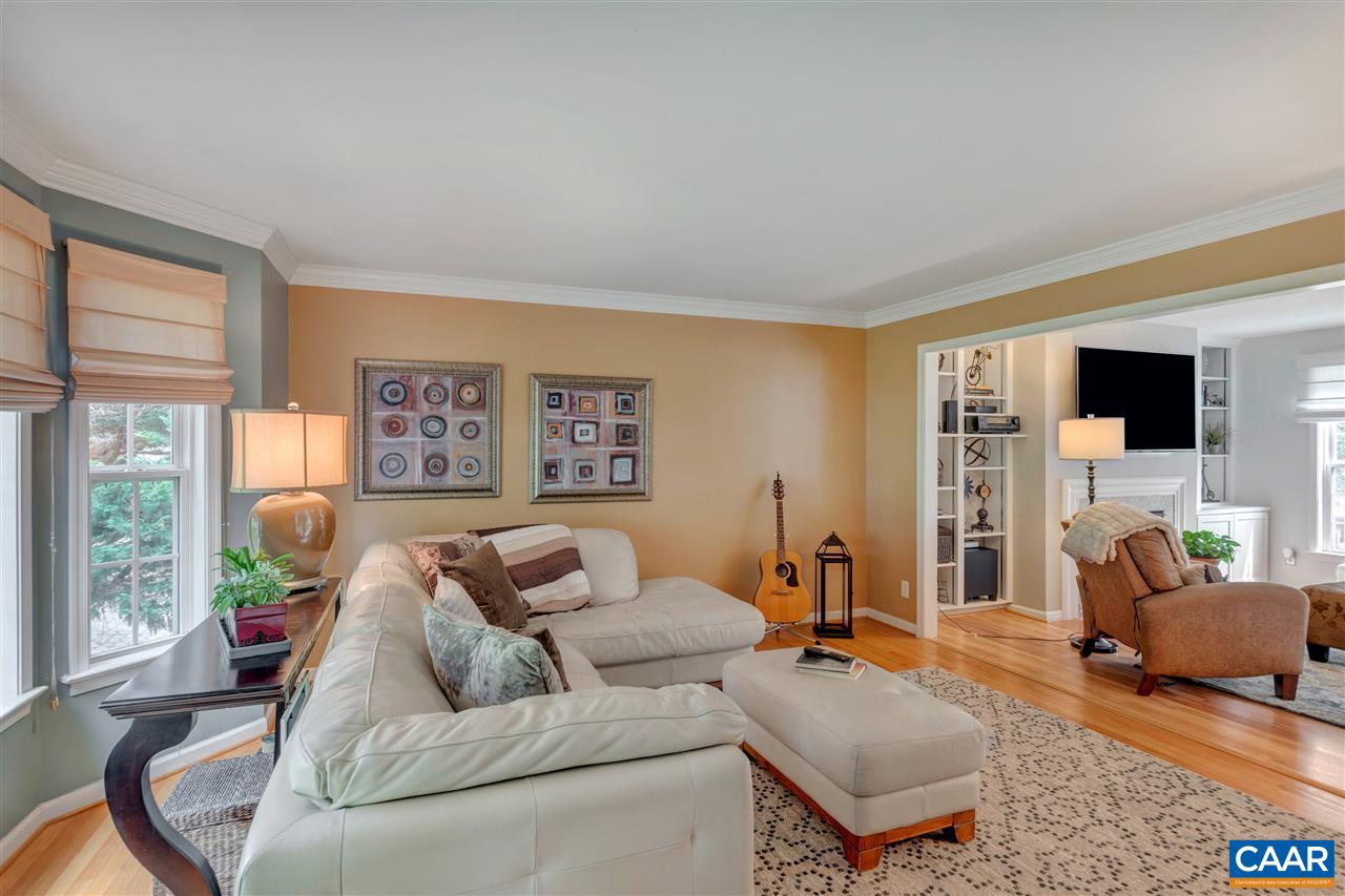 1209 Raintree Drive Charlottesville, VA 22901 - Photo 11 of 46 a living room with furniture and a flat screen tv