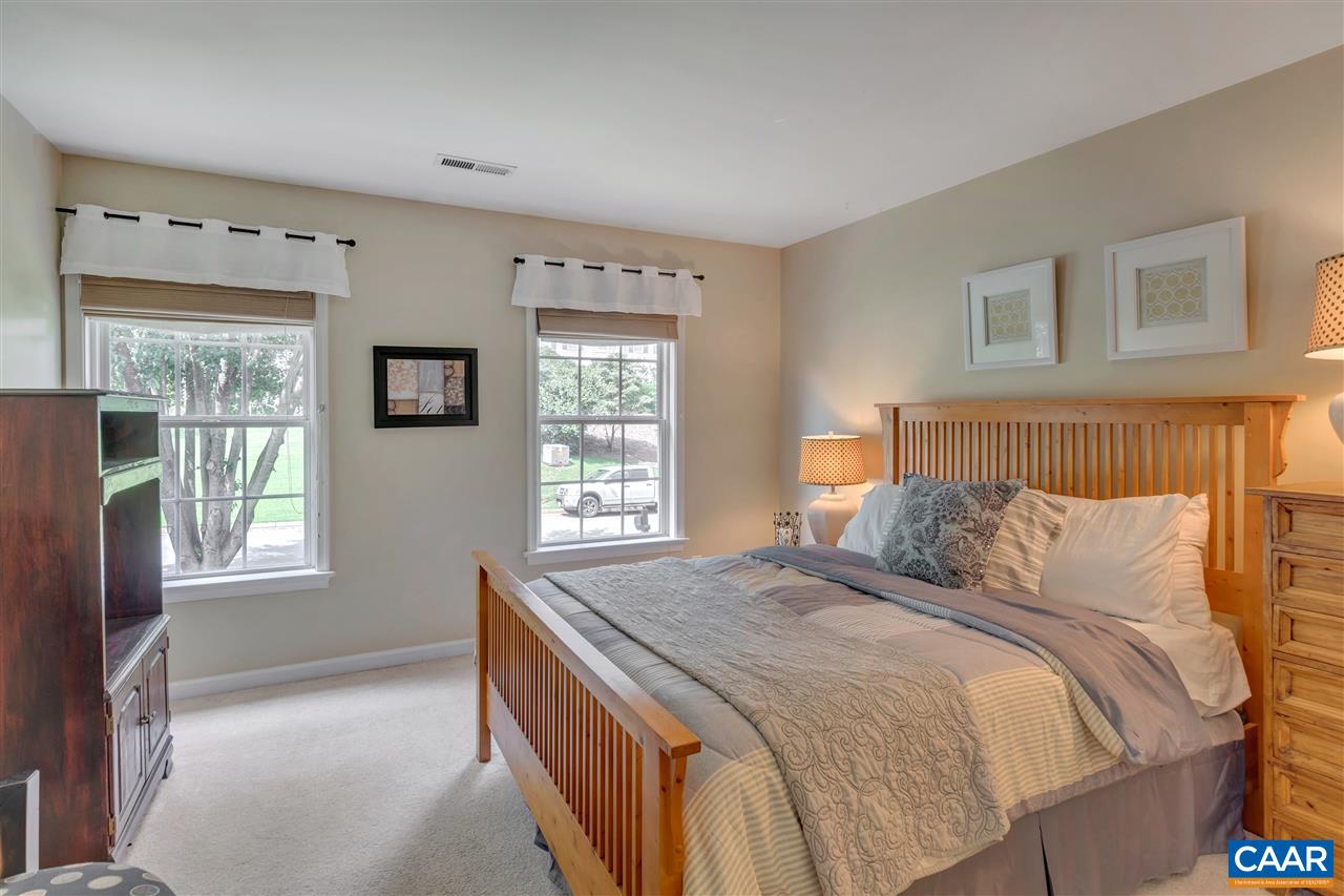 1209 Raintree Drive Charlottesville, VA 22901 - Photo 26 of 46 a bedroom with a bed and a window