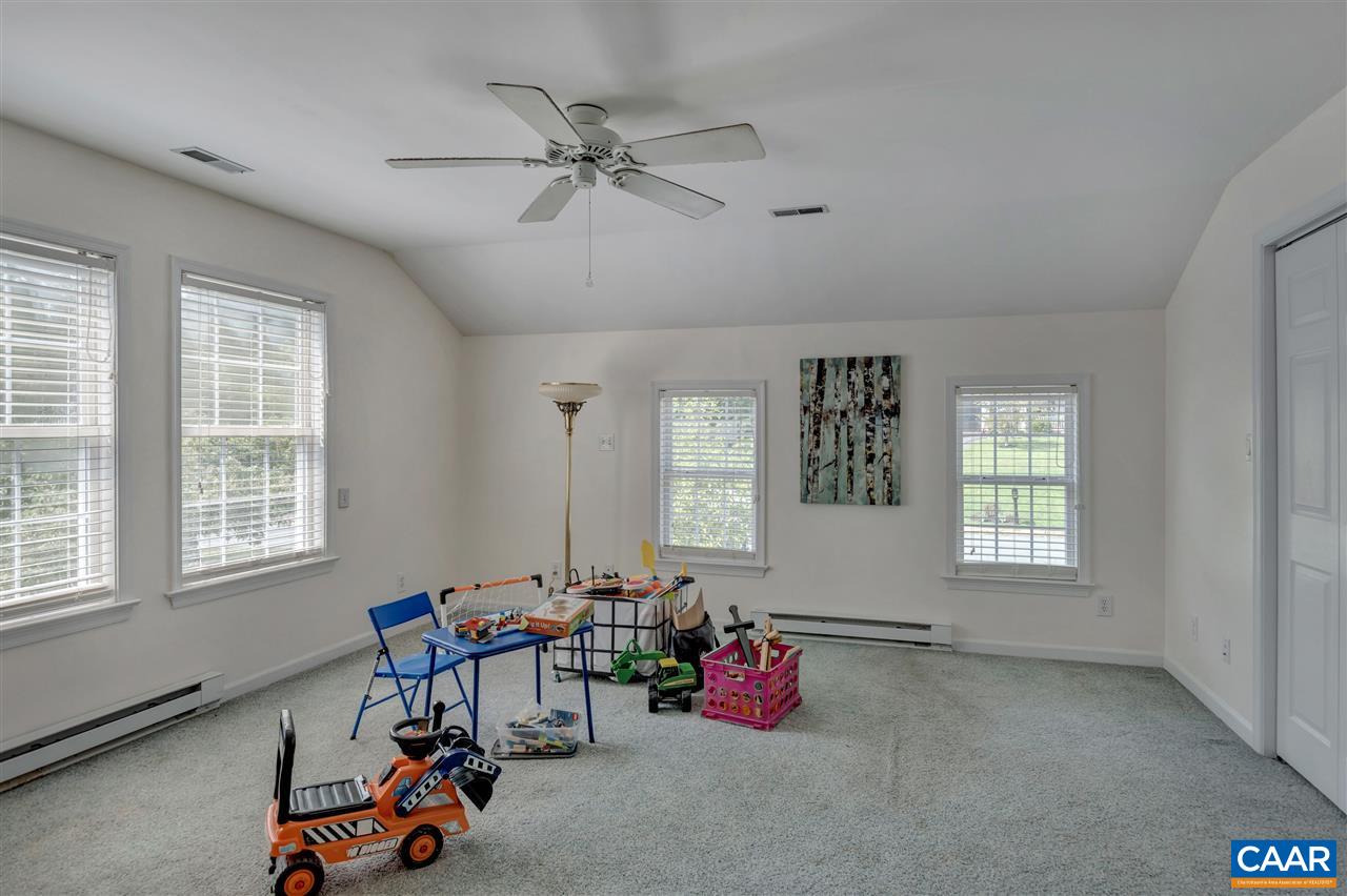 1209 Raintree Drive Charlottesville, VA 22901 - Photo 37 of 46 a living room with furniture and windows