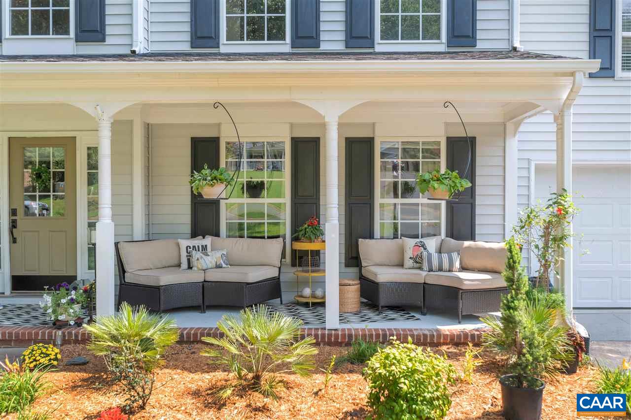 1209 Raintree Drive Charlottesville, VA 22901 - Photo 4 of 46 a view of a patio with couches table and chairs