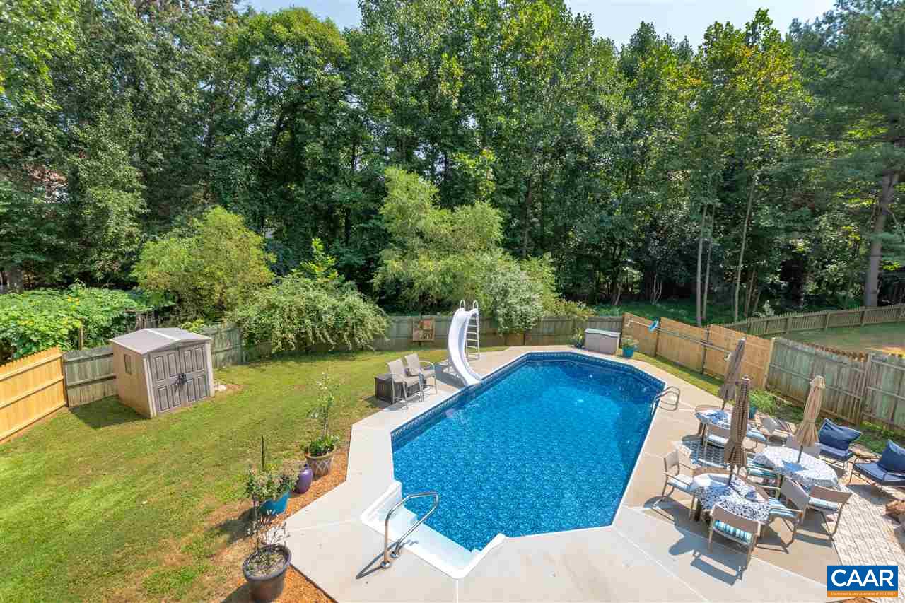 1209 Raintree Drive Charlottesville, VA 22901 - Photo 43 of 46 a view of a swimming pool with a patio