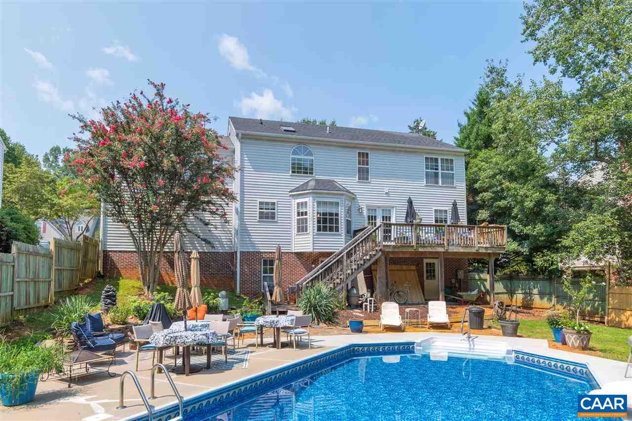 1209 Raintree Drive Charlottesville, VA 22901 - Photo 44 of 46 a front view of a house with swimming pool and sitting area