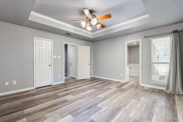 a view of an empty room and window