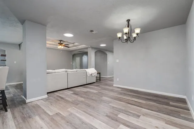 a view of a room with a chandelier