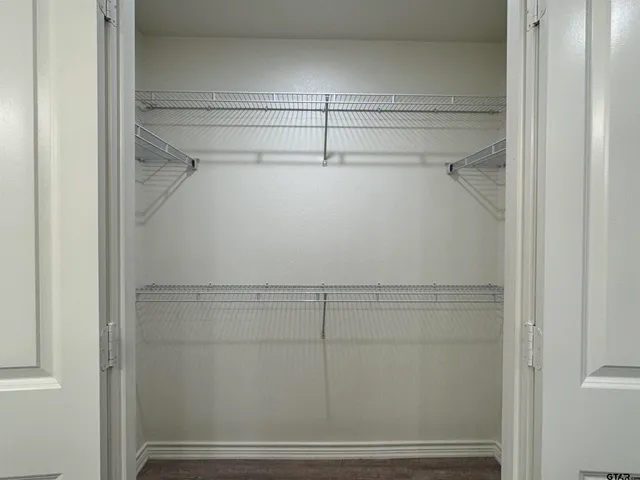 a view of small space with wooden floor