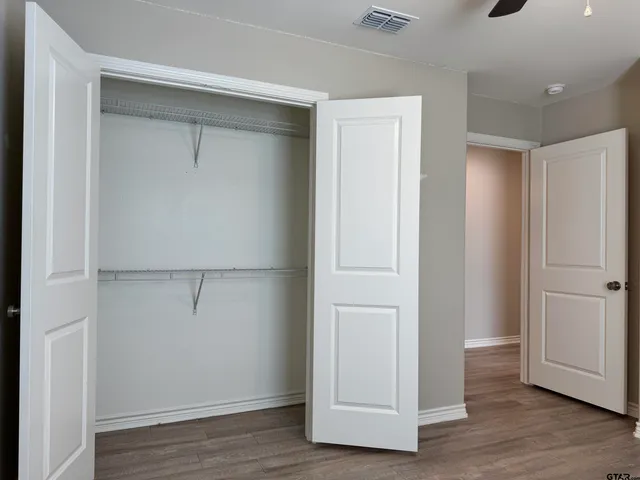 a bathroom with a bathtub and a sink