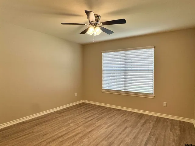 a view of a livingroom with wooden floor