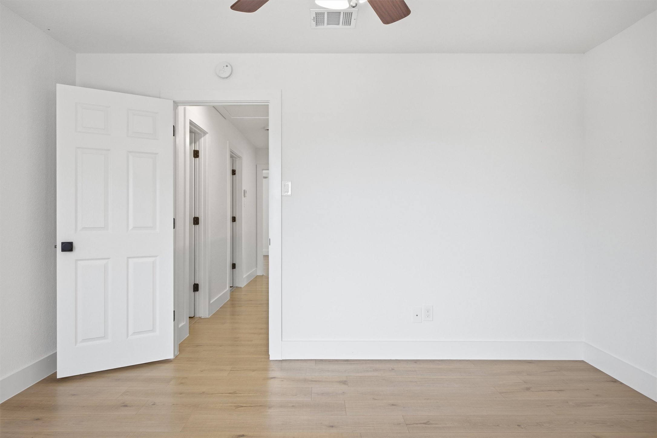 6708 Panda Royle Drive Del Valle, TX 78617 - Photo 34 of 40 a view of a room with wooden floor