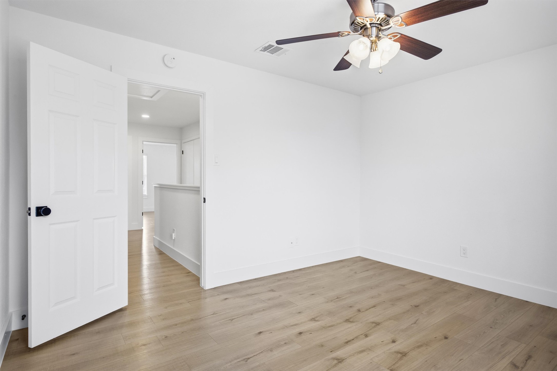 6708 Panda Royle Drive Del Valle, TX 78617 - Photo 36 of 40 a view of empty room with wooden floor