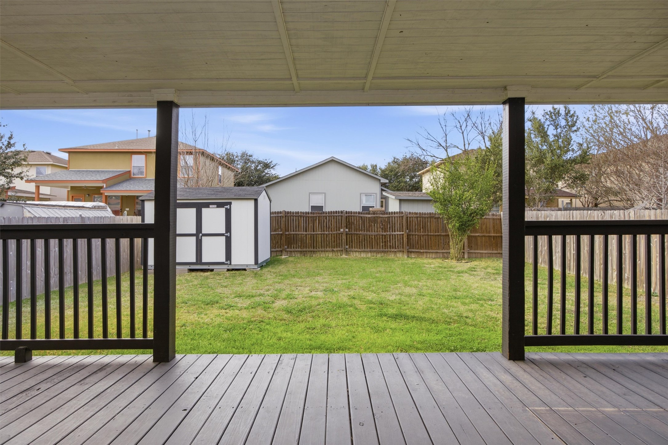 6708 Panda Royle Drive Del Valle, TX 78617 - Photo 37 of 40 a view of a porch with a yard