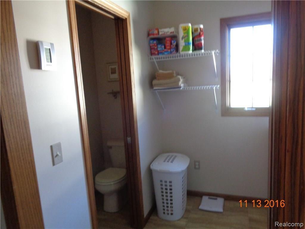 4460 Capac Road Capac, MI 48014 - Photo 11 of 26 Capac Road laund bath.JPG