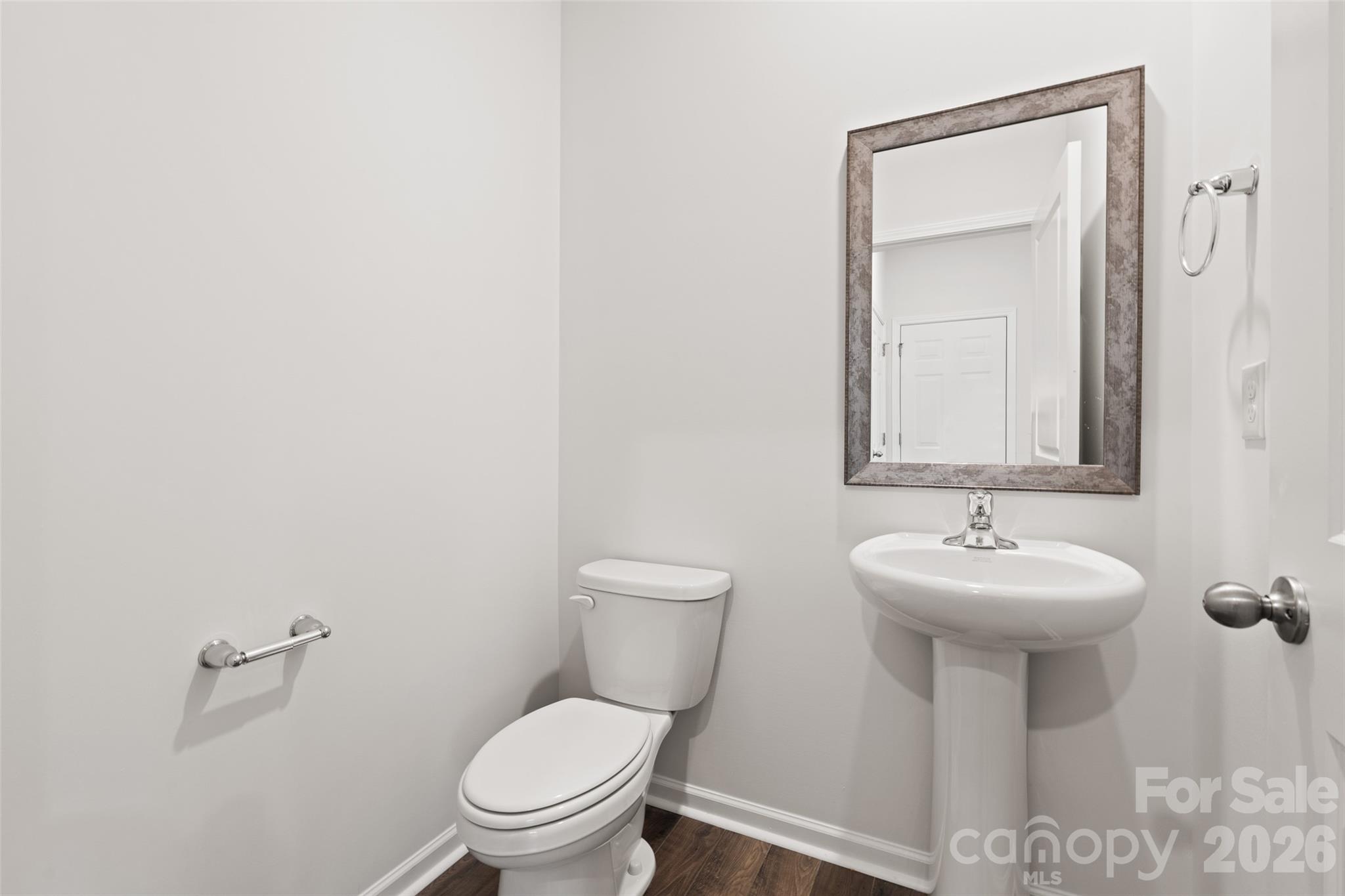 132 Salers Road Fletcher, NC 28732 - Photo 13 of 29 a bathroom with a toilet sink and mirror