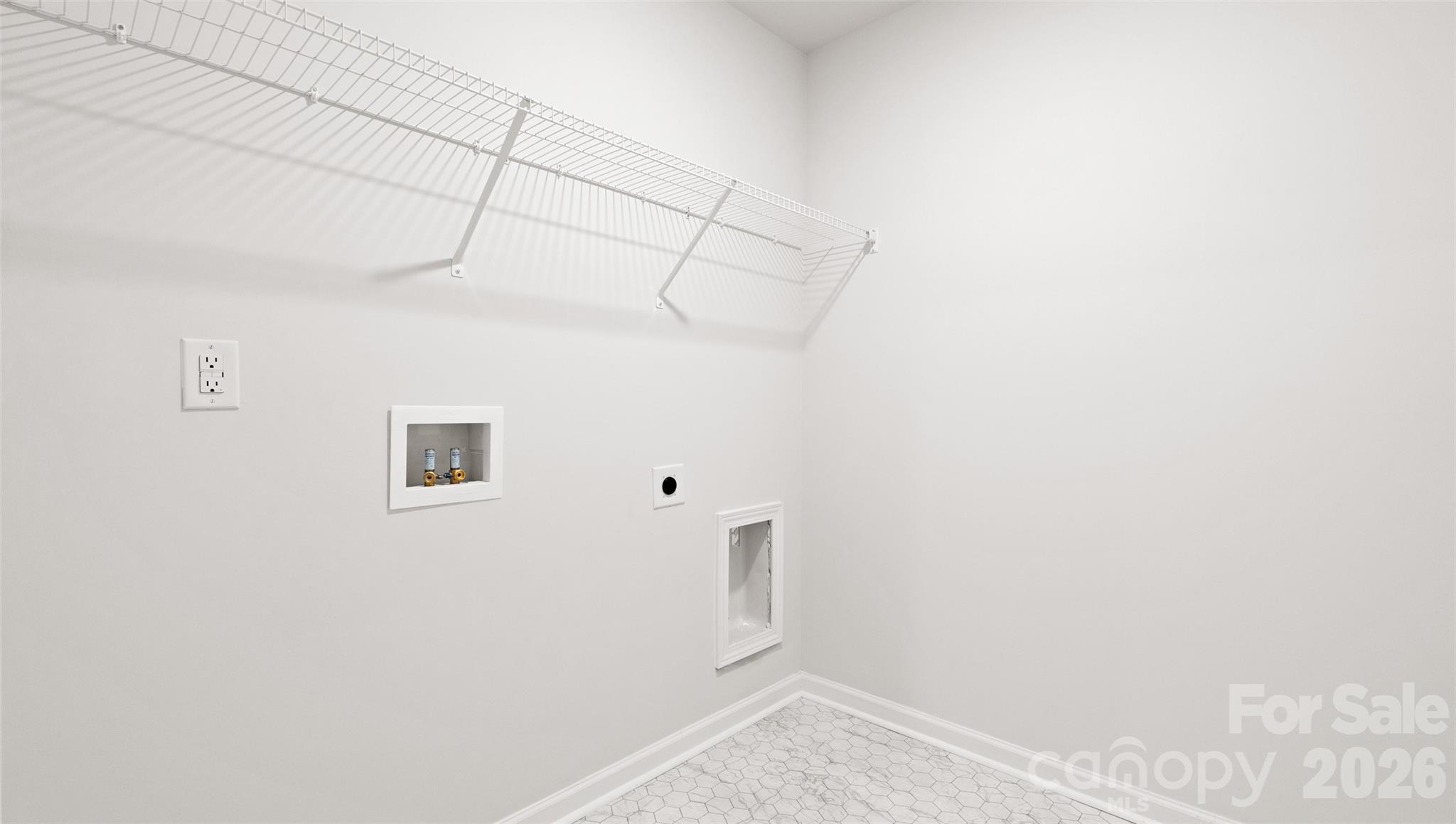 132 Salers Road Fletcher, NC 28732 - Photo 19 of 29 a view of a room with racks on the wall