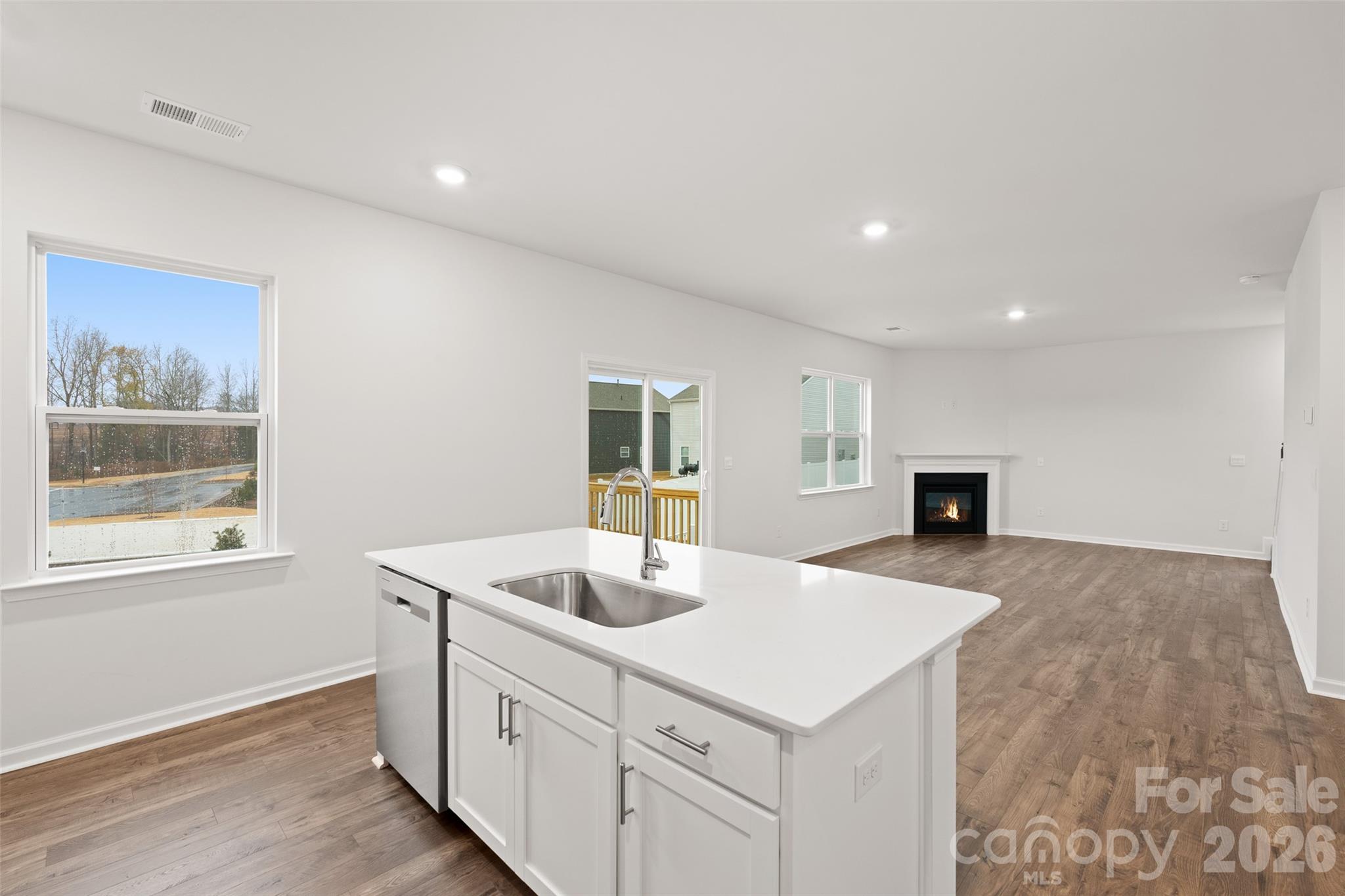 132 Salers Road Fletcher, NC 28732 - Photo 7 of 29 a kitchen with sink and microwave