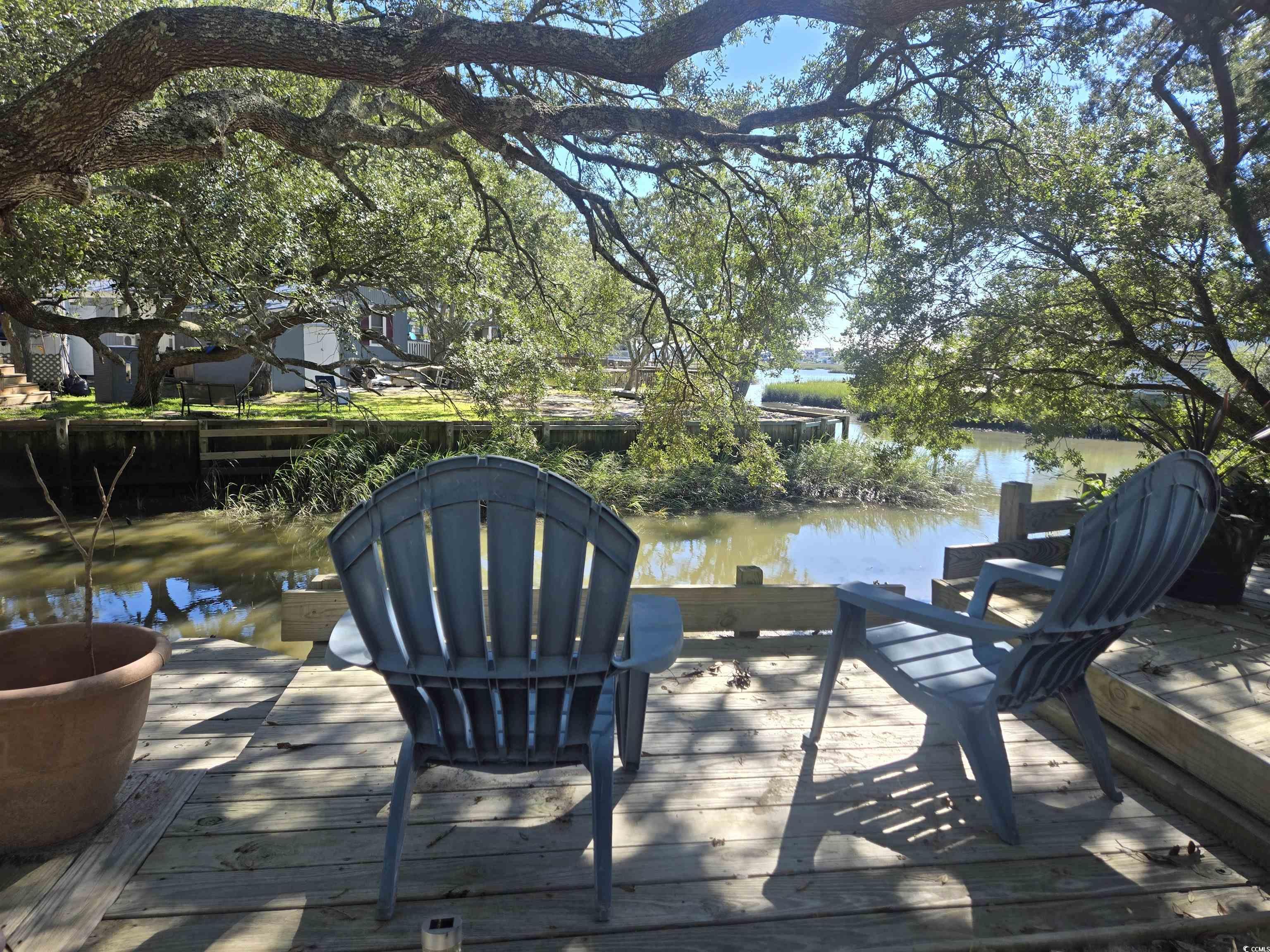 359 Lagoon Circle Murrells Inlet, SC 29576 - Photo 11 of 39 Dock area with a deck with water view