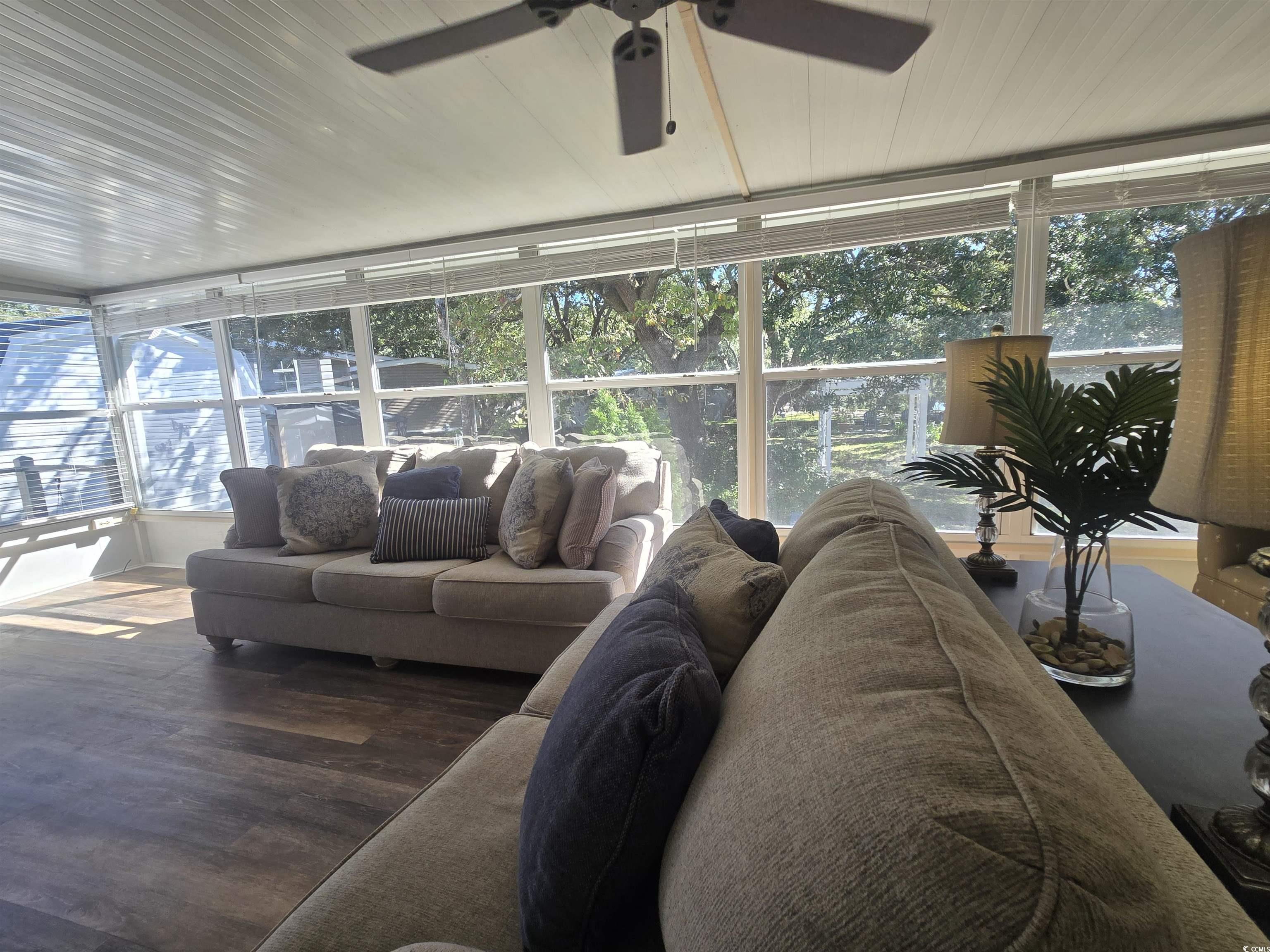 359 Lagoon Circle Murrells Inlet, SC 29576 - Photo 14 of 39 Sunroom / solarium featuring wood finished floors