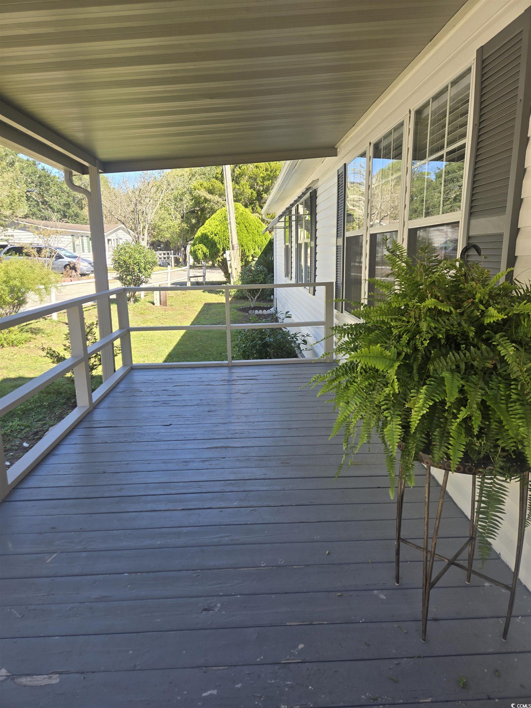 359 Lagoon Circle Murrells Inlet, SC 29576 - Photo 4 of 39 Deck featuring a yard