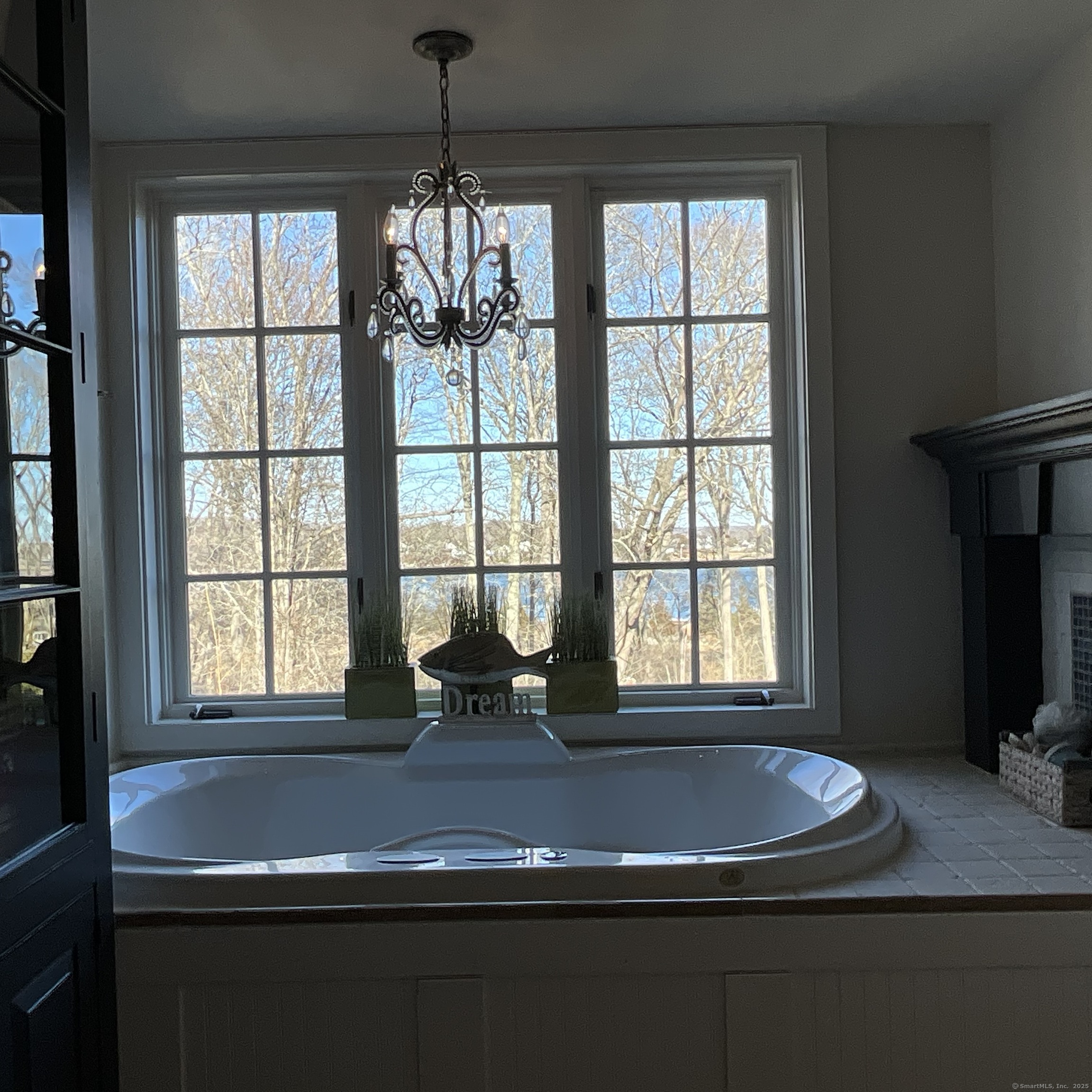 44 Brook Street Groton, CT 06340 - Photo 17 of 39 a view of a dining room with a window