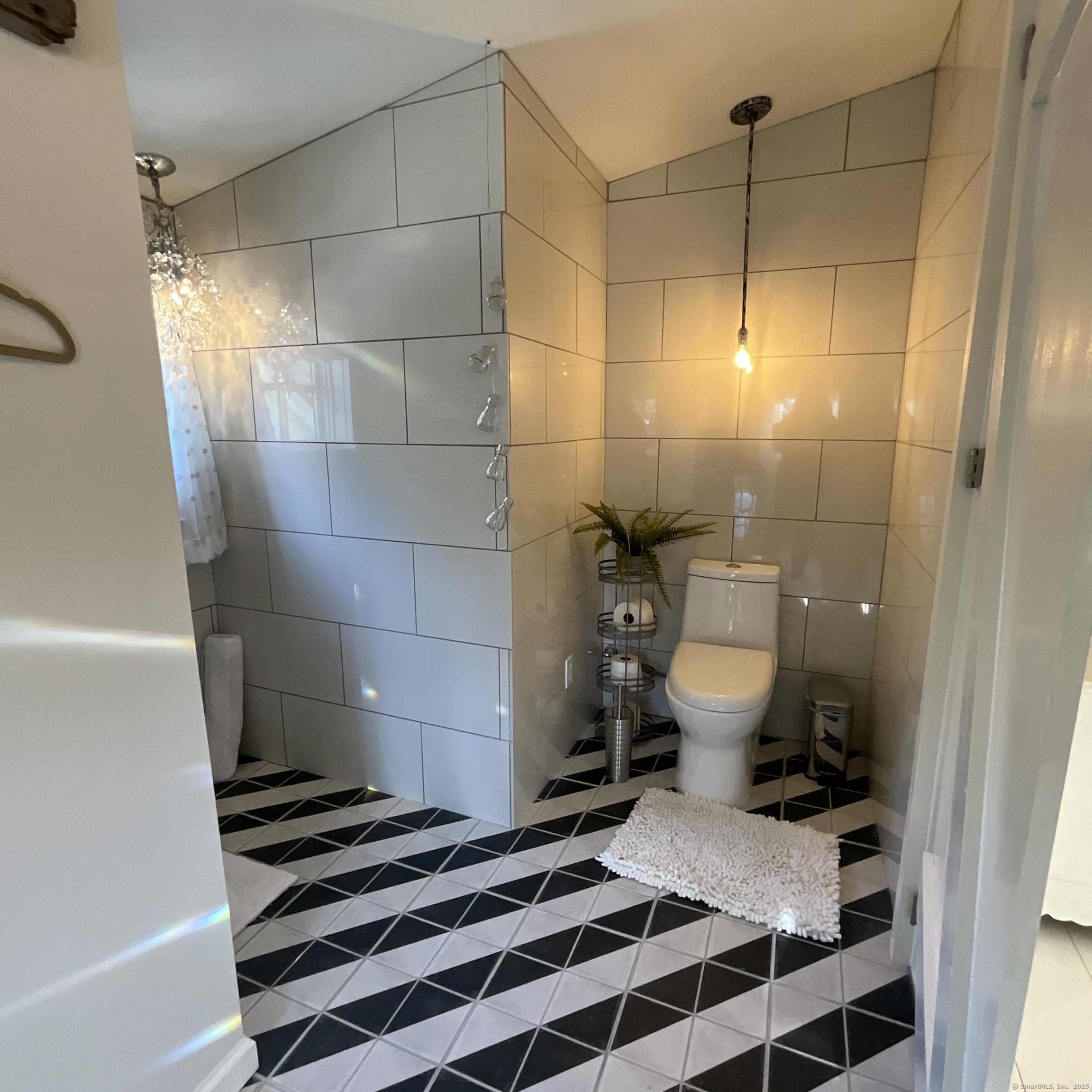 44 Brook Street Groton, CT 06340 - Photo 23 of 39 a bathroom with a sink and a shower