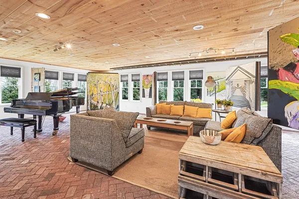 a view of a porch with furniture