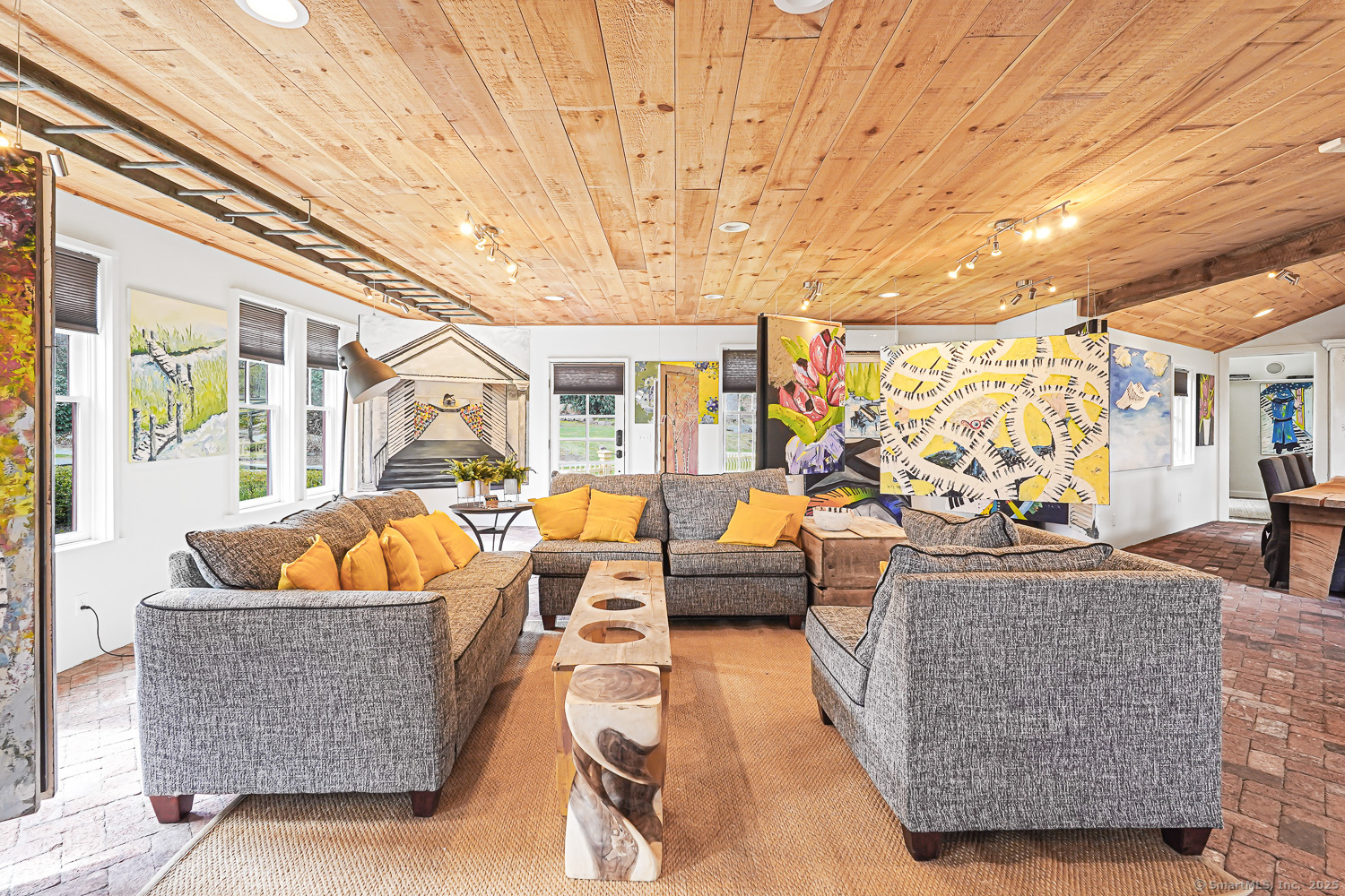 44 Brook Street Groton, CT 06340 - Photo 28 of 39 a living room with furniture and a large window
