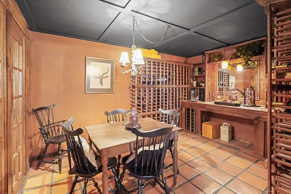 a dinning table and chairs in a patio