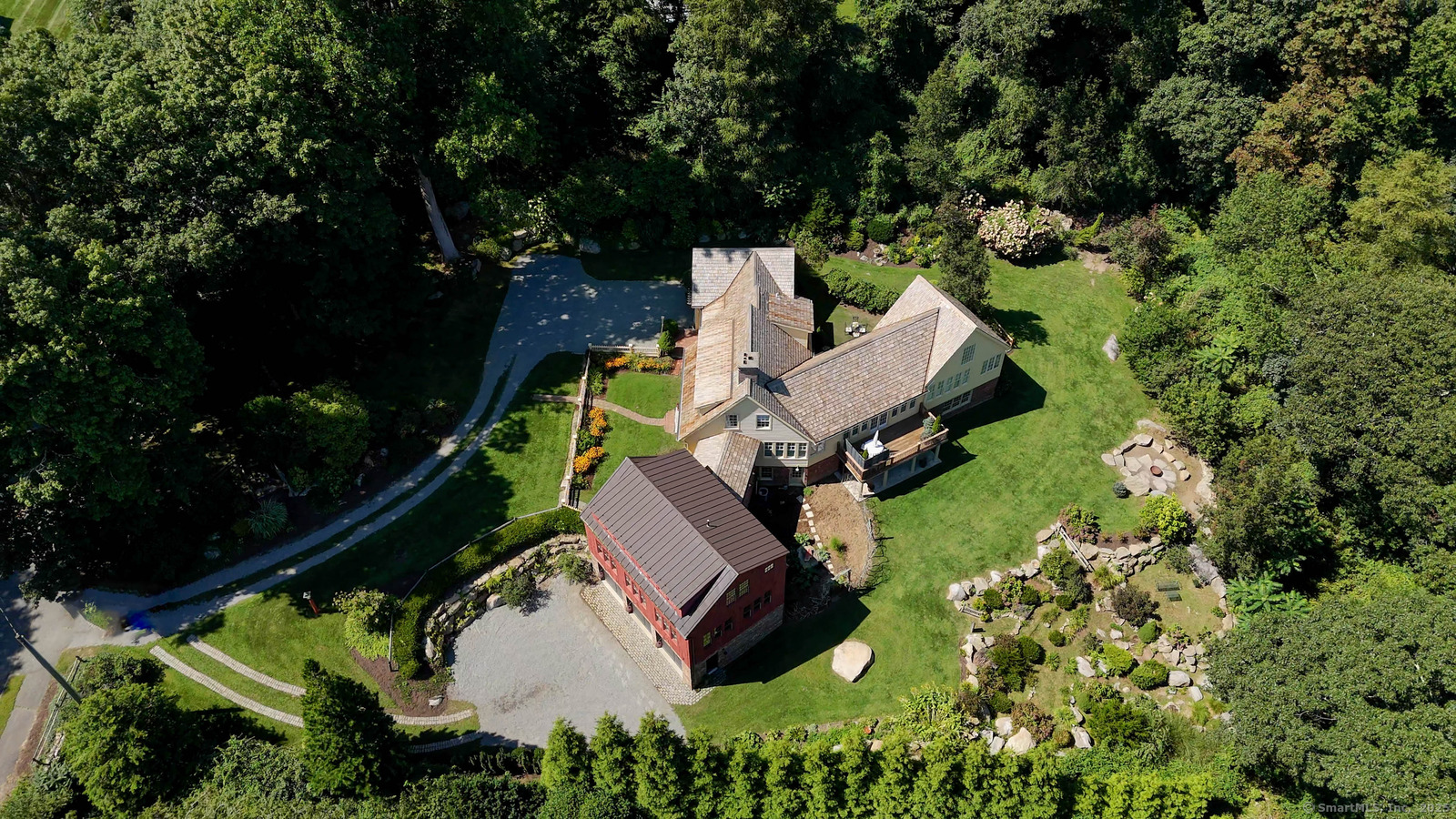44 Brook Street Groton, CT 06340 - Photo 5 of 39 an aerial view of a house with garden space and street view