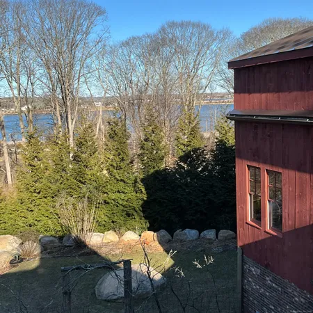 a backyard of a house with lots of green space