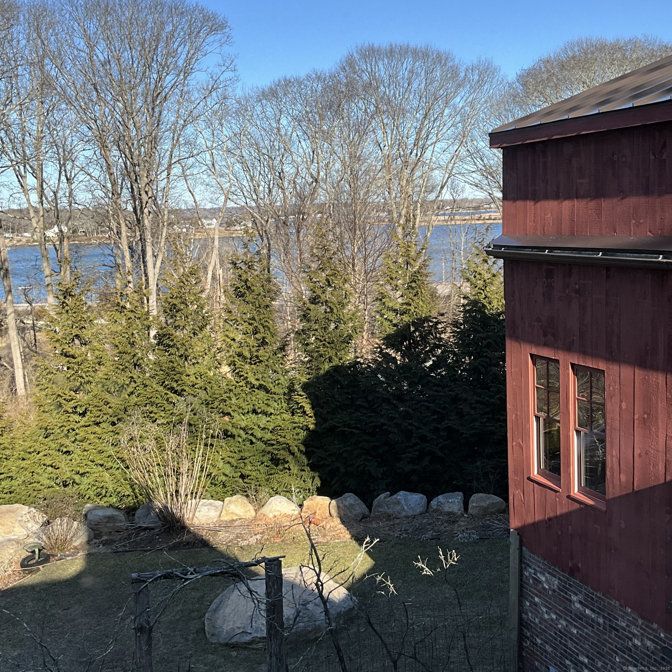 44 Brook Street Groton, CT 06340 - Photo 6 of 39 a backyard of a house with lots of green space