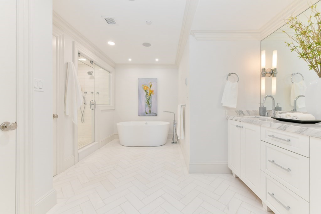 361 Beacon Street, Unit 3 Boston, MA 02116 - Photo 16 of 23 a spacious bathroom with a double vanity sink and a mirror