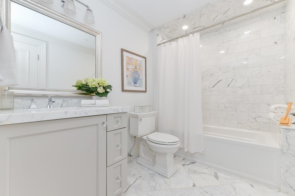 361 Beacon Street, Unit 3 Boston, MA 02116 - Photo 20 of 23 a bathroom with a granite countertop sink toilet and shower