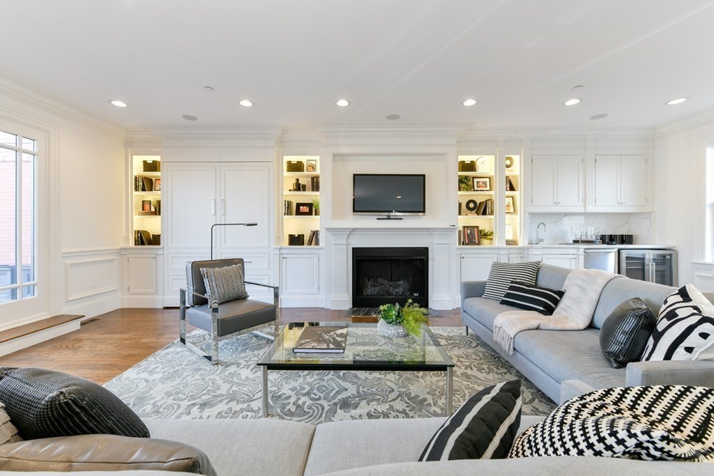 361 Beacon Street, Unit 3 Boston, MA 02116 - Photo 9 of 23 a living room with furniture and a fireplace
