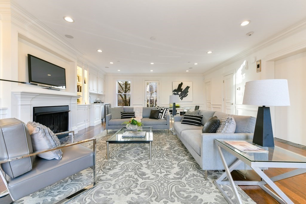 361 Beacon Street, Unit 3 Boston, MA 02116 - Photo 10 of 23 a living room with furniture fireplace and flat screen tv
