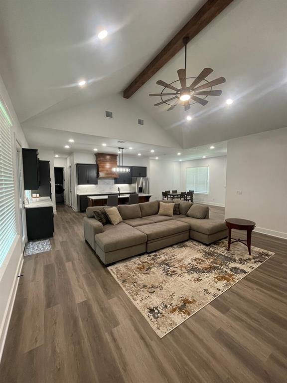1484 Dixie Road Whitesboro, TX 76273 - Photo 2 of 18 a living room with furniture and kitchen view