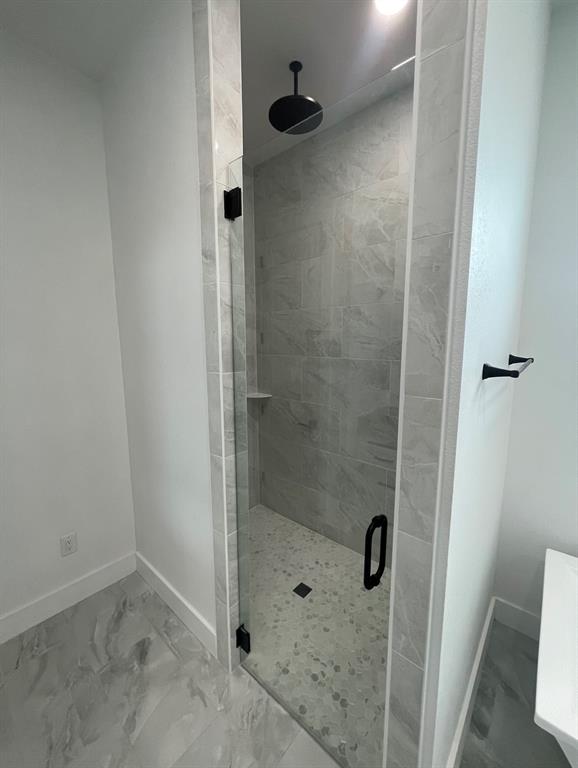 1484 Dixie Road Whitesboro, TX 76273 - Photo 9 of 18 a bathroom with a shower