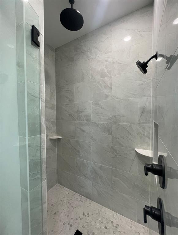 1484 Dixie Road Whitesboro, TX 76273 - Photo 10 of 18 a bathroom with a shower