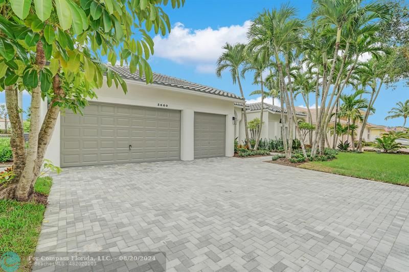 Cooper City Hollywood, FL 33024 - Photo 3 of 39 front view of a house with a yard and garage