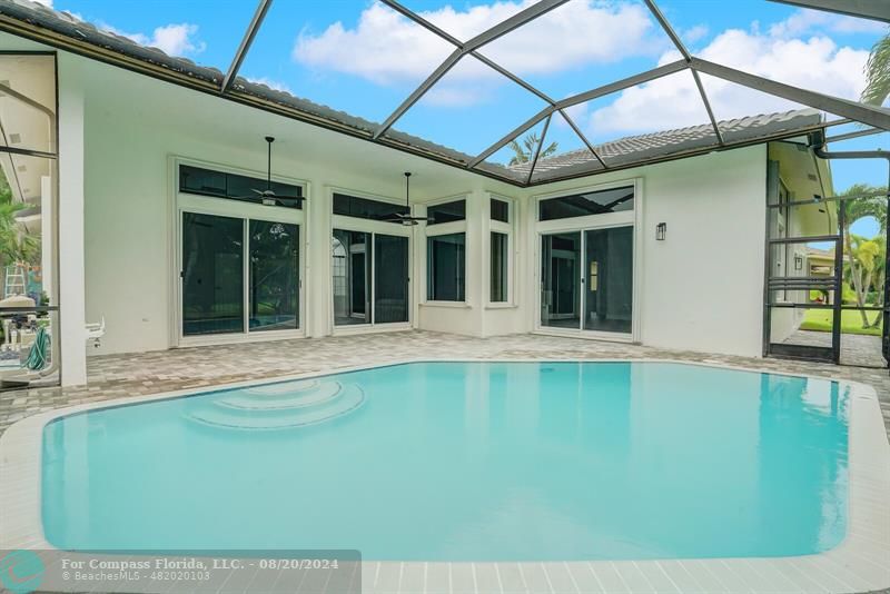 Cooper City Hollywood, FL 33024 - Photo 33 of 39 a view of a house with a swimming pool