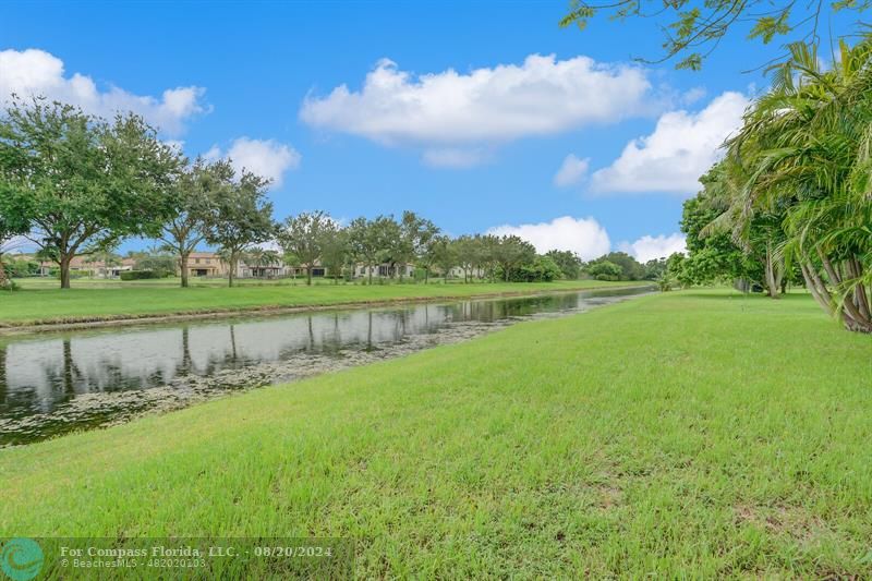 Cooper City Hollywood, FL 33024 - Photo 34 of 39 a view of a lake with a yard