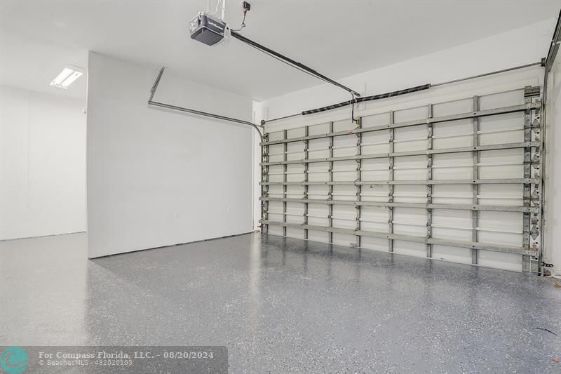 Cooper City Hollywood, FL 33024 - Photo 37 of 39 a view of a room with racks on the wall