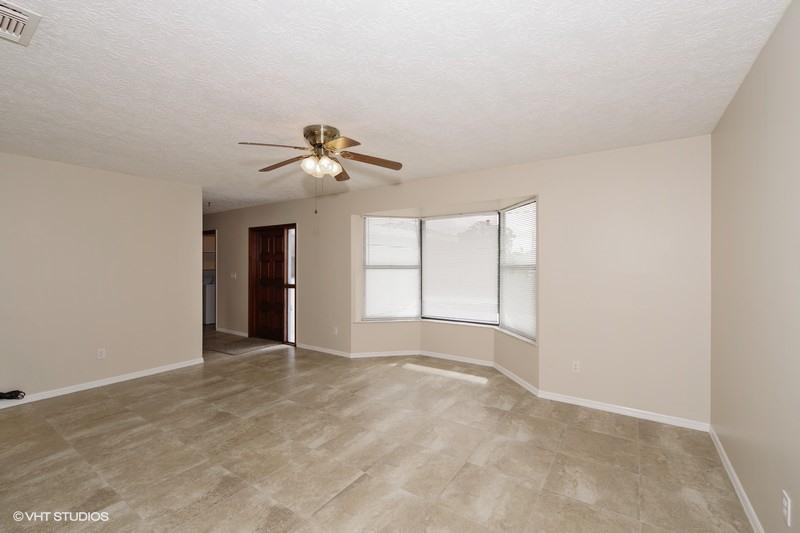 921 Southwest Bay State Road Port St. Lucie, FL 34953 - Photo 2 of 10 Living Room