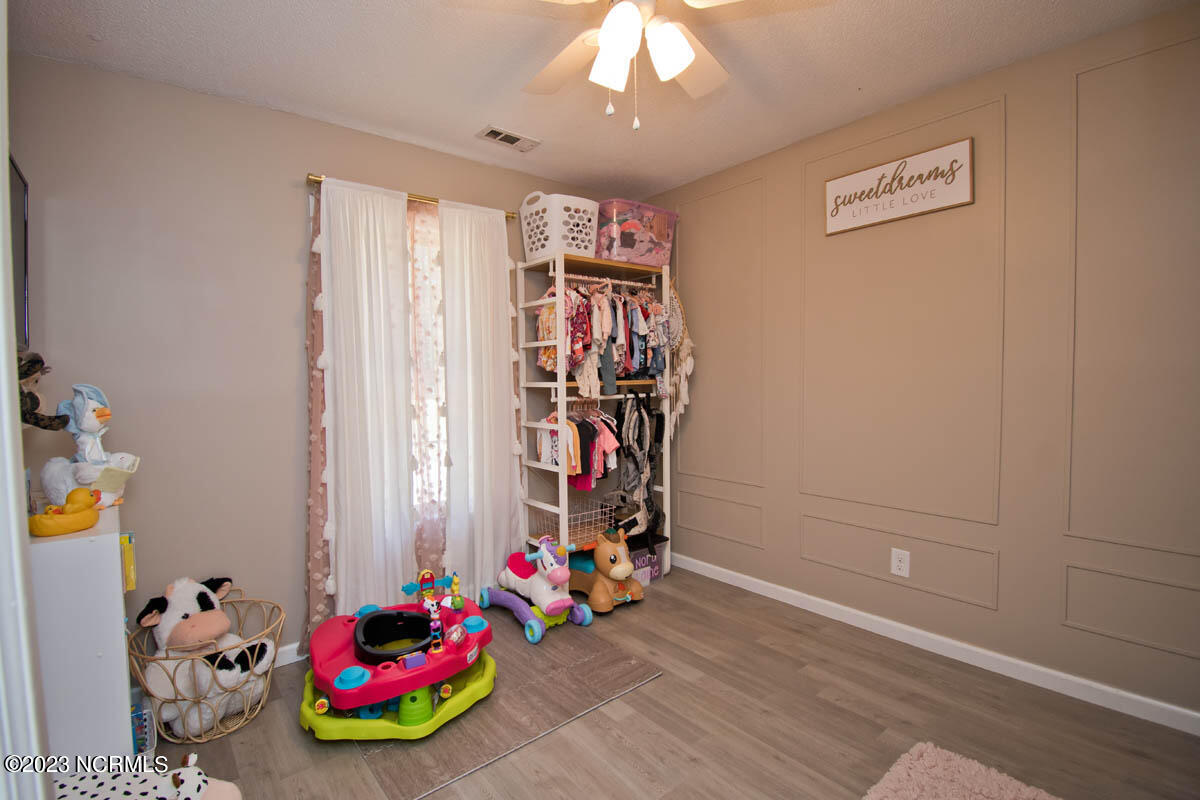 249 Sand Ridge Road Hubert, NC 28539 - Photo 13 of 27 lots of room in this guest bedroom