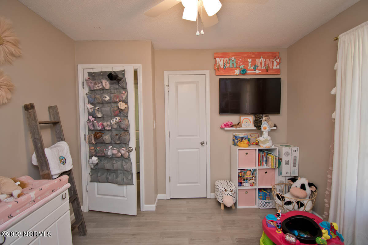 249 Sand Ridge Road Hubert, NC 28539 - Photo 24 of 27 guest bedroom looking out